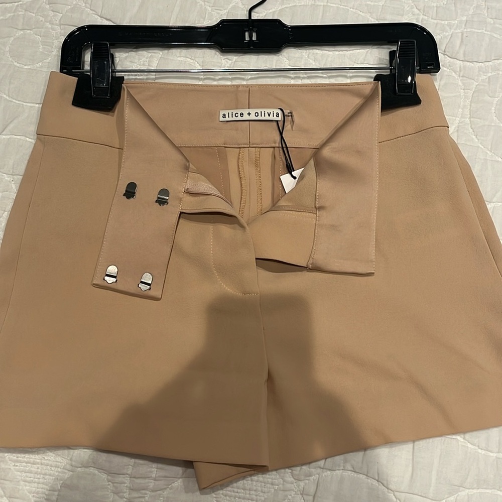 Size 4 Alice and Olivia almond colored shorts.